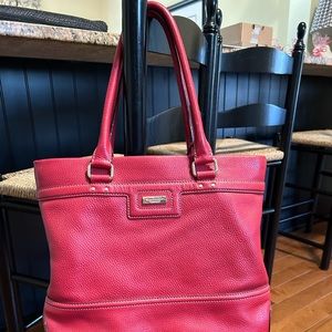 Kate Spade pebbled red leather tote bag.
